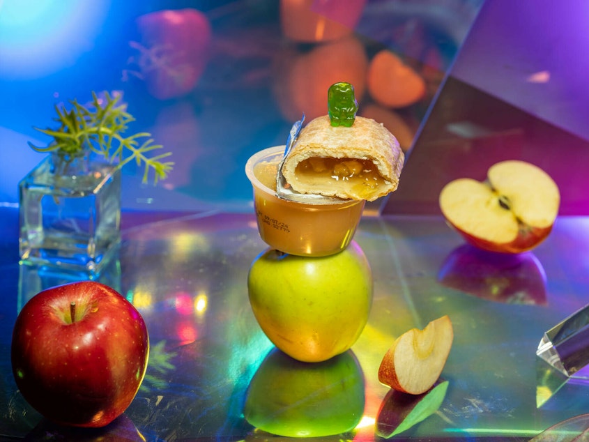 caption: Foods that are ultraprocessed are those that have many added ingredients like artifical colors or preservatives. An apple undergoes minimal processing when it gets made into applesauce. But when it gets made into a shelf-stable apple pie or candy gummies with added coloring, these foods are considered ultraprocessed.