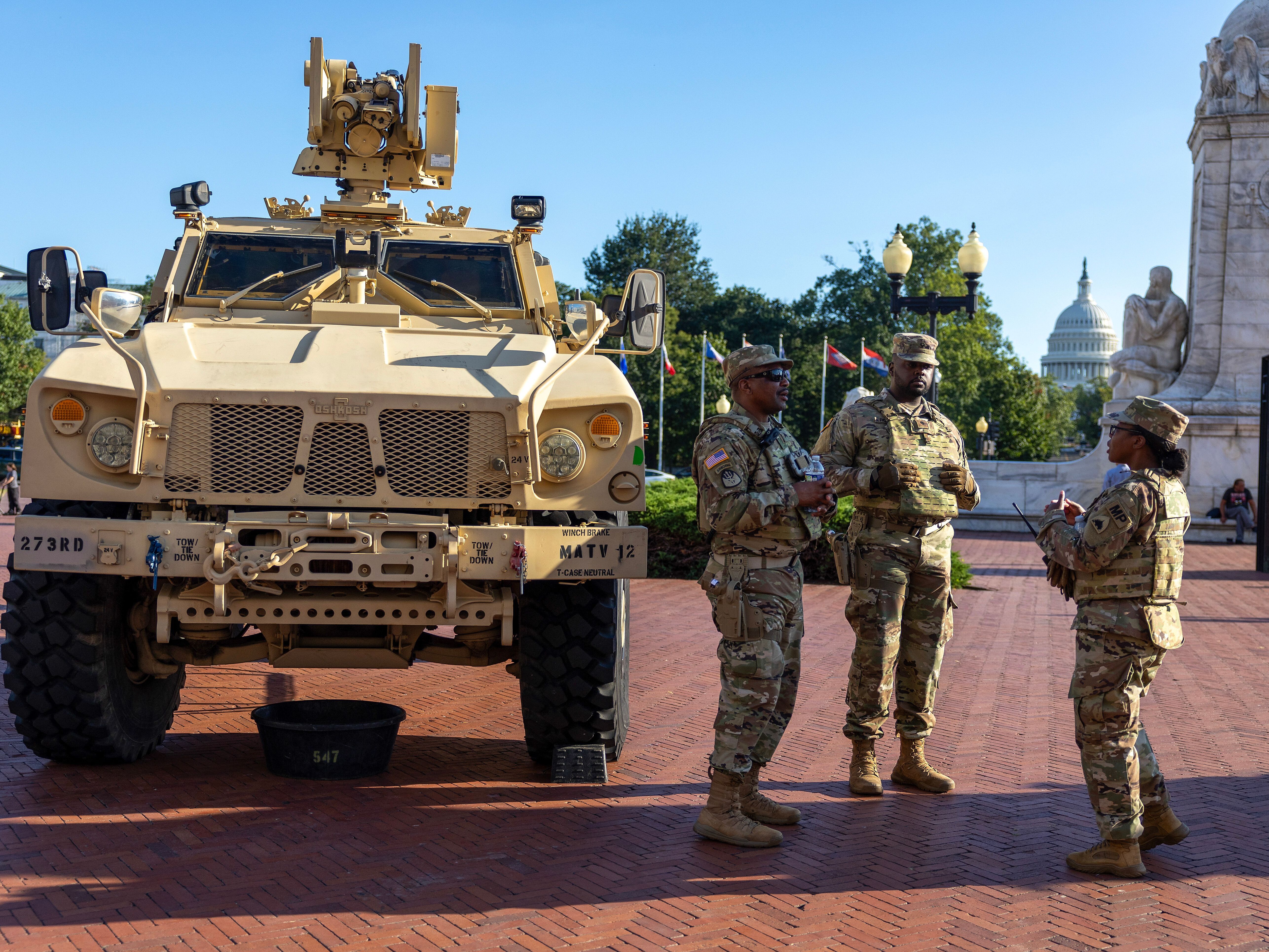 caption: National Guard troops stand outside Union Station on Monday in Washington, D.C.
