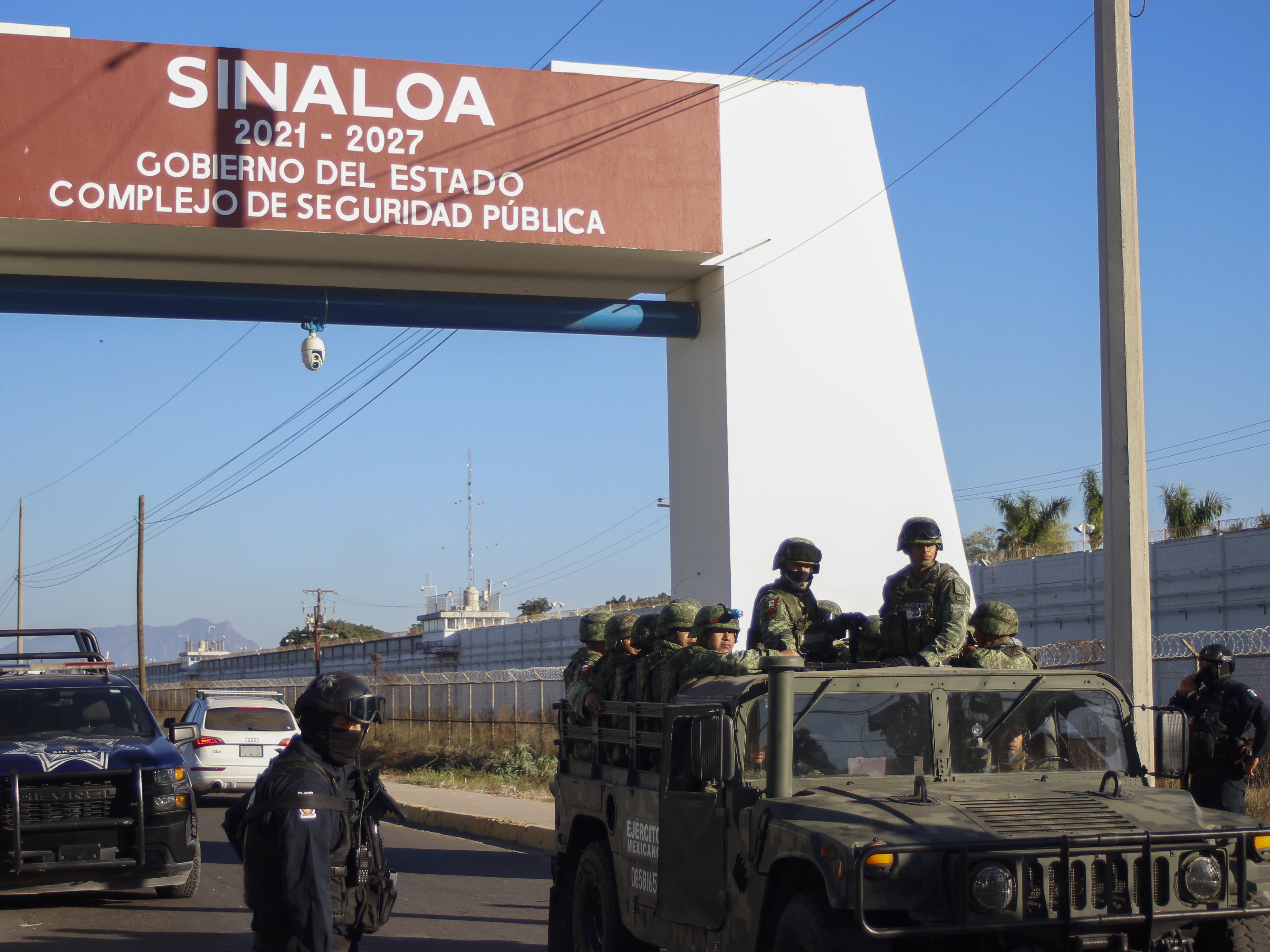 caption: Mexican military and police are seen patroling in Culiacan, Sinaloa state, Mexico, on Jan. 6, 2023.