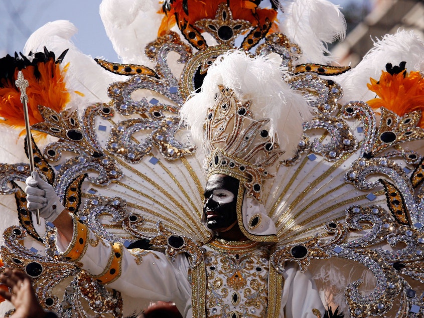 caption: King Zulu waves to the crowds from his float on Mardi Gras day on Feb. 24, 2009 in New Orleans. The Zulu Social Aid & Pleasure Club is facing criticism for its tradition of wearing black face makeup during Mardi Gras.