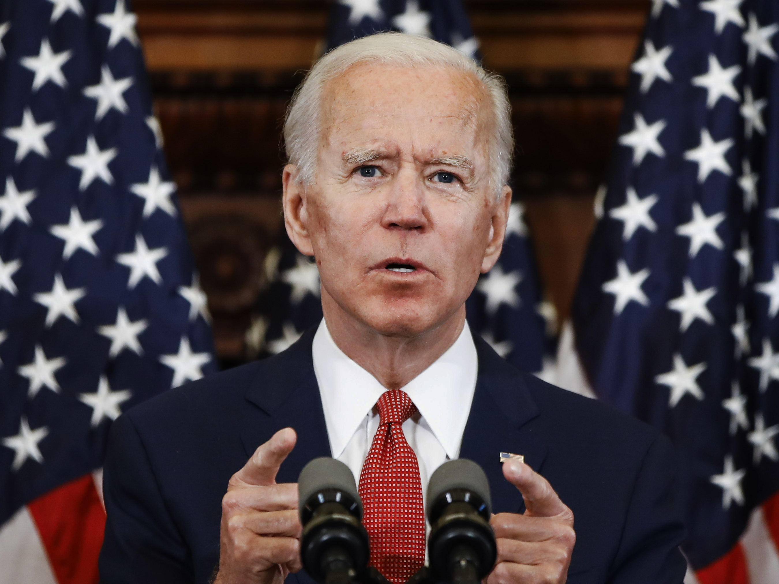 caption: Former Vice President Joe Biden speaks in Philadelphia. He has now secured enough delegates to win the Democratic presidential nomination.