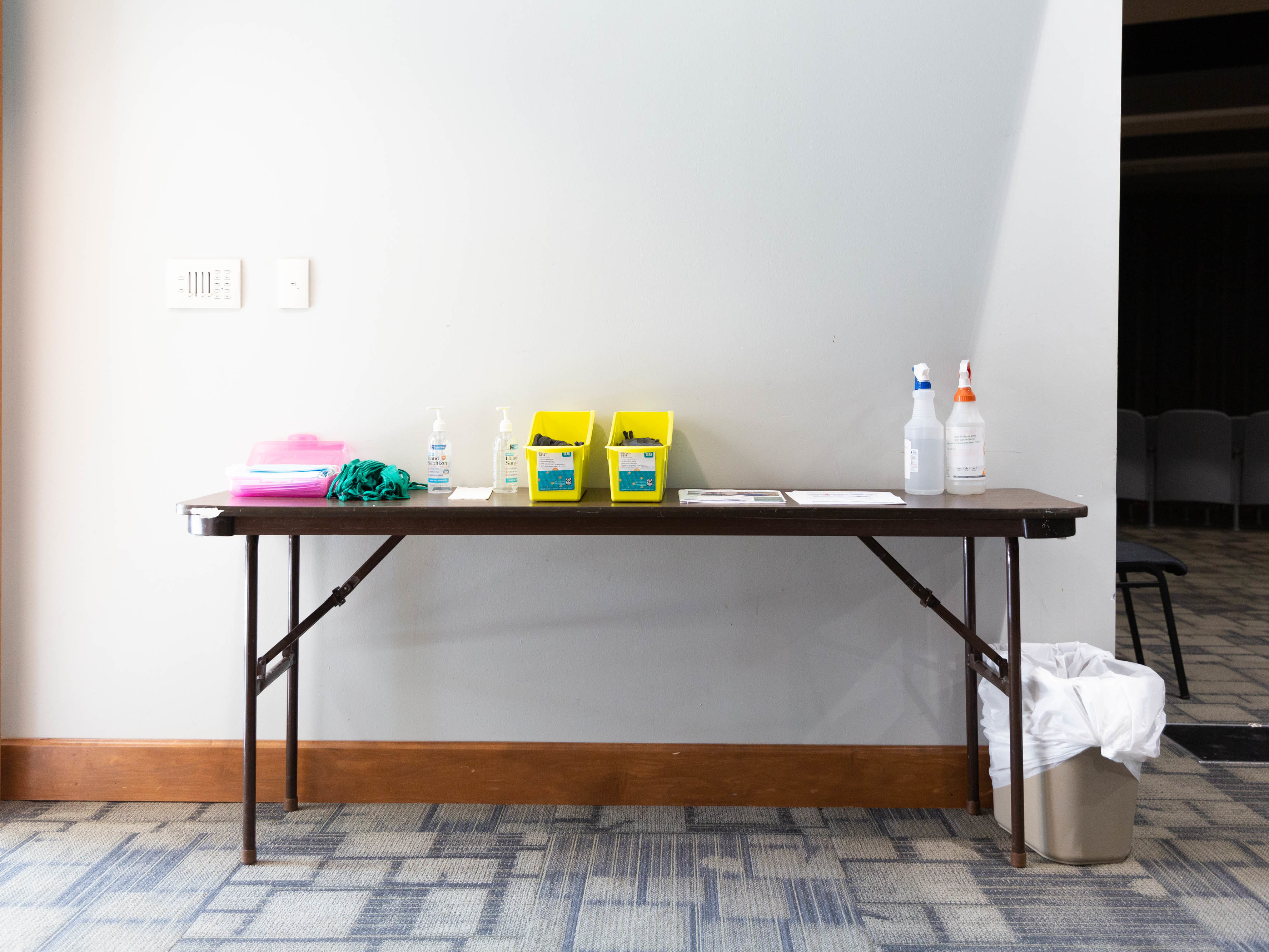 caption: Arkansas Gov. Asa Hutchinson promoted COVID-19 vaccinations at a community town hall at Arkansas State University Mountain Home (ASUMH) in Mountain Home, Arkansas, on July 16. Arkansas is one of several states that has passed laws prohibiting vaccine requirements.