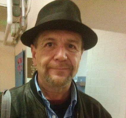 caption: Buddy McArdle, a Real Change newspaper vendor, was in Bellevue to recruit new vendors for the papers expansion.