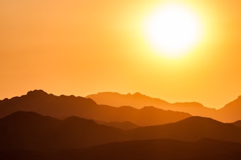 caption: The sun radiates over Nevada. 
