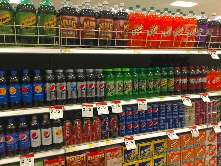 caption: A proposal to tax sugary drinks like soda pop in Seattle passed Monday.