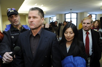 caption: Richard and Mayumi Heene leave a Larimer County, Colo., courtroom after their sentencing hearing in 2009. Richard Heene was sentenced to 90 days in jail, 100 hours of community service and four years probation for his part in the "Balloon Boy" hoax. Mayumi Heene was sentenced to 20 days in jail and four years probation.