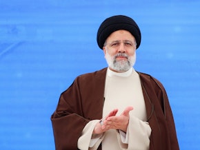 caption: In this handout image supplied by the Office of the President of the Islamic Republic of Iran, Iranian President Ebrahim Raisi is pictured at the Qiz Qalasi Dam, constructed on the Aras River on the joint borders between Iran and Azerbaijan. Raisi was seen as a potential successor to Iran's supreme leader.