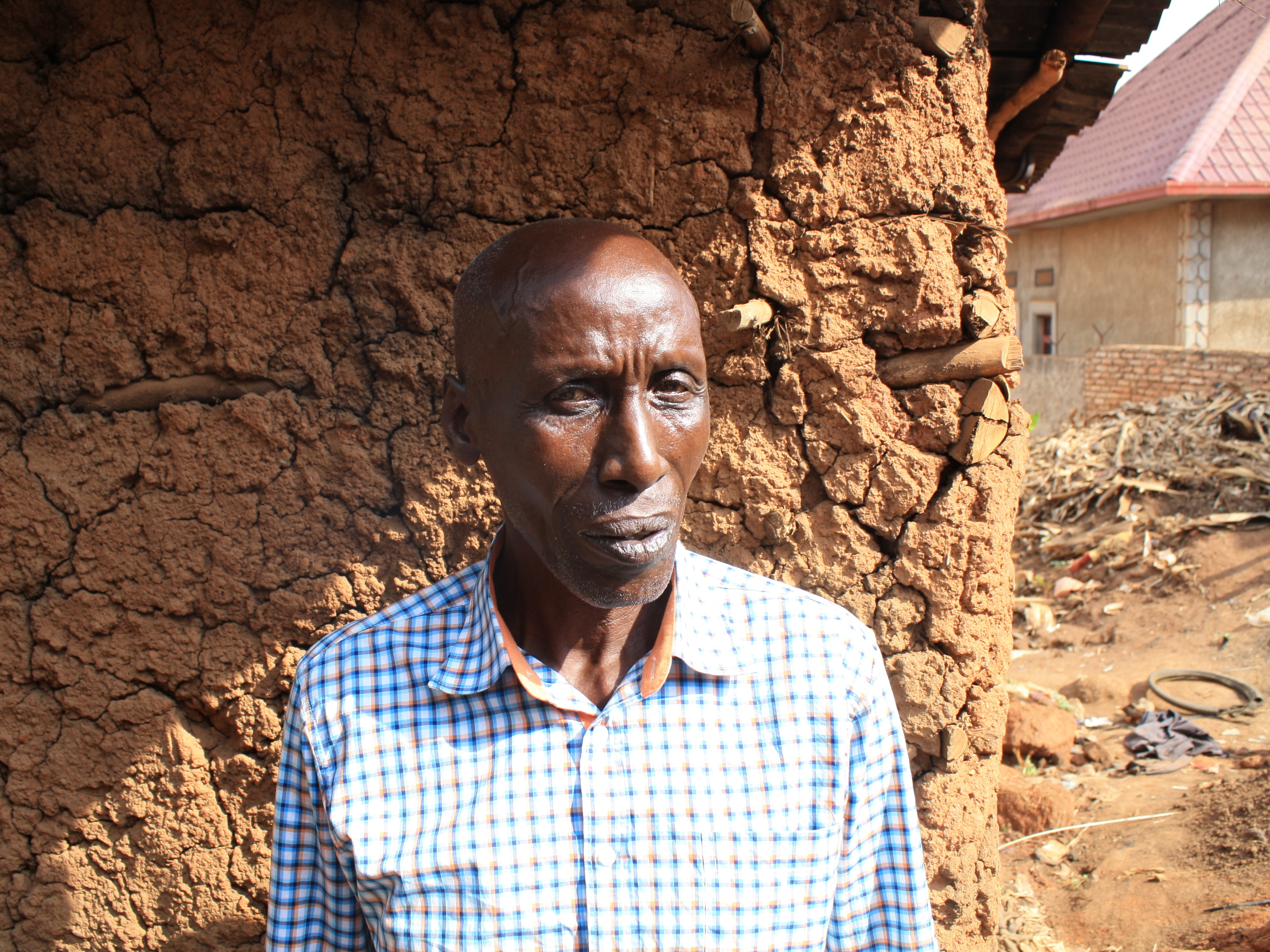 caption: Innocent Gasinzigwa lost his wife and seven children in the 1994 Rwandan genocide. He believes God allowed him to live so that he could lay the bodies of genocide victims to rest.
