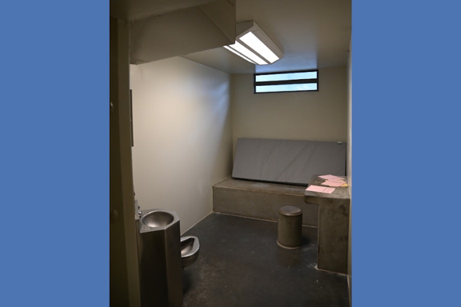 caption:  A solitary confinement cell at Monroe Correctional Complex.