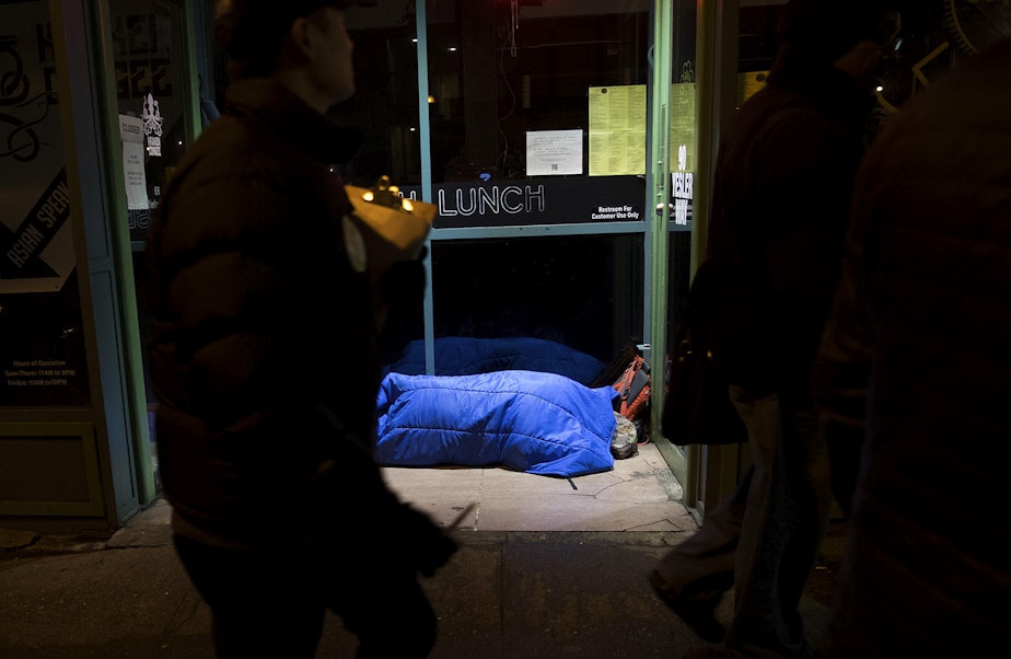 caption: Volunteers count the number of people experiencing homelessness during the annual King County Point-In-Time count on Friday, January 25, 2018, in Pioneer Square.