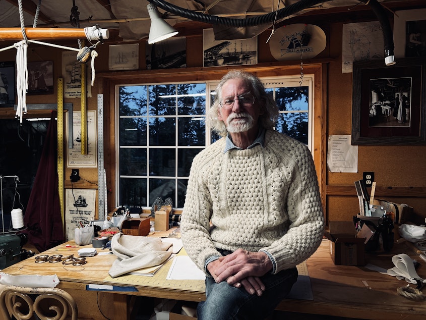 caption: Wayne Chimenti, pictured near a craft table in the sail loft. 