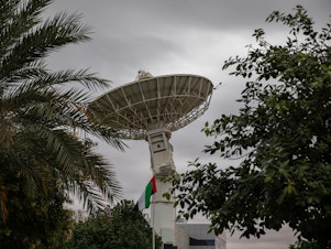caption: A satellite dish outside the Mohammed Bin Rashid Space Centre on in Dubai, United Arab Emirates.