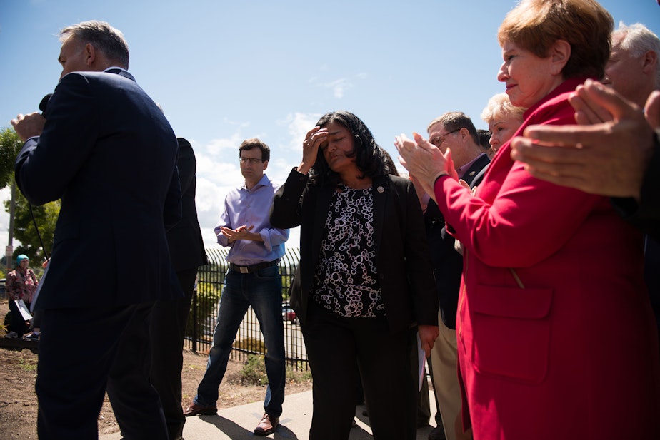 caption: U.S. Rep. Pramila Jayapal outside the SeaTac Federal Detention Center, where a group of asylum seekers are currently held.