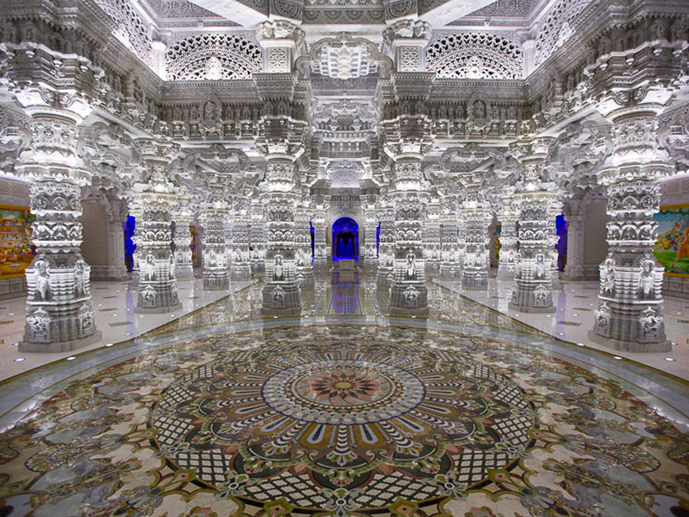 caption: A class-action lawsuit recently filed in federal court in New Jersey alleges that the BAPS Hindu temple in Robbinsville brought some 200 workers to the U.S. on R-1 visas as "religious volunteers."