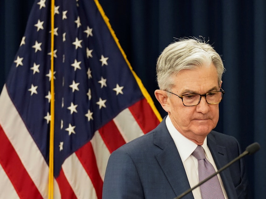 caption: The Federal Reserve says "it has become clear that our economy will face severe disruptions" due to the coronavirus pandemic. Here, Fed Chairman Jerome Powell is seen as the Federal Reserve cut interest rates earlier this month — one of several emergency moves designed to protect the world's largest economy.