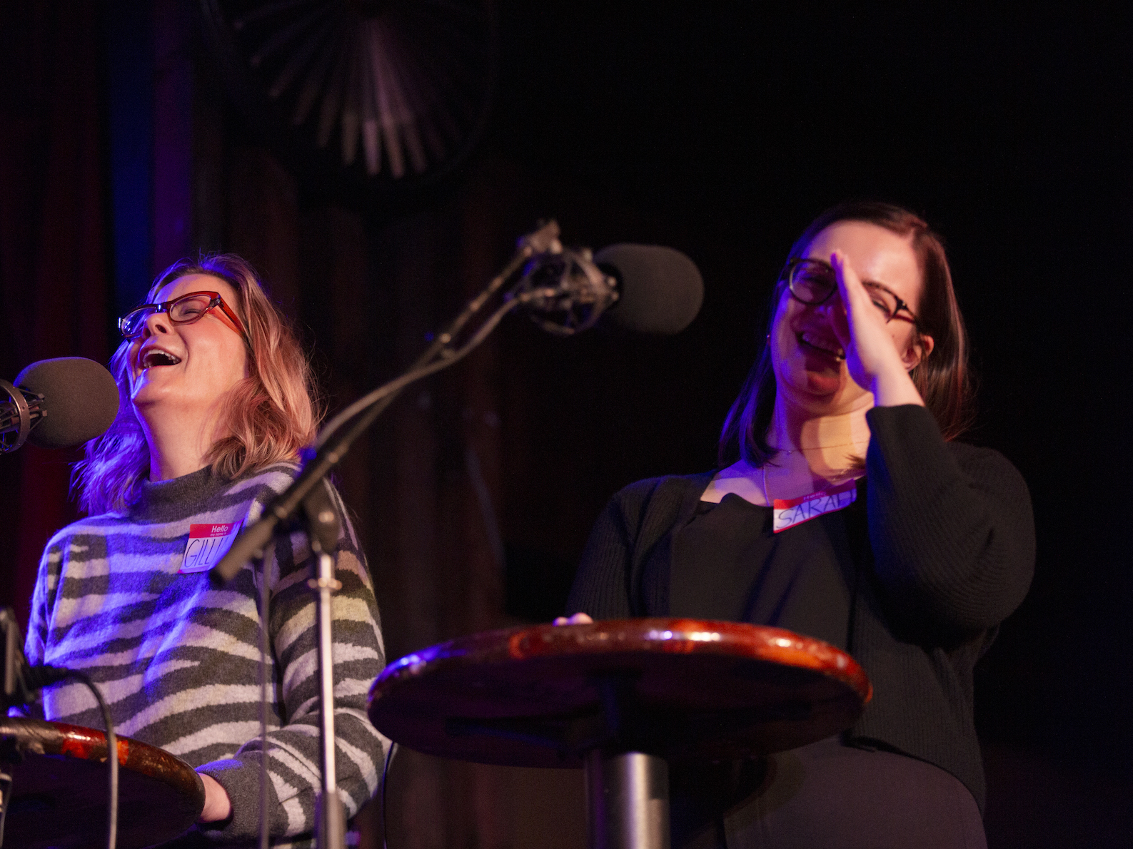 caption: Contestants go head to head on <em>Ask Me Another</em> at the Bell House in Brooklyn, New York.