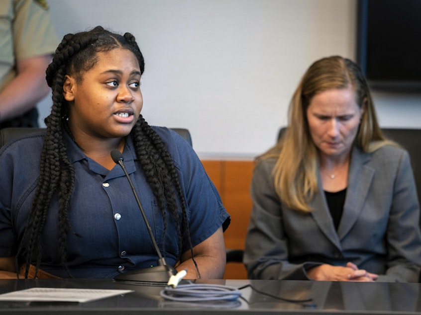 caption: Pieper Lewis, left, speaks with Polk County District Judge David M. Porter during her sentencing hearing on Sept. 13. Donations are pouring in to help Lewis, a 17-year-old sex trafficking victim who was ordered by the court to pay $150,000 to the family of a man she stabbed to death after he raped her.