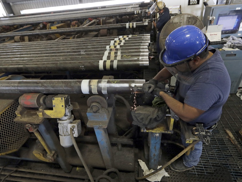 caption: Jerry Castillo prepares a steel pipe at the Borusan Mannesmann Pipe manufacturing facility Tuesday, June 5, 2018, in Baytown, Texas. The company is seeking a waiver from the steel tariff to import tubing and casing.