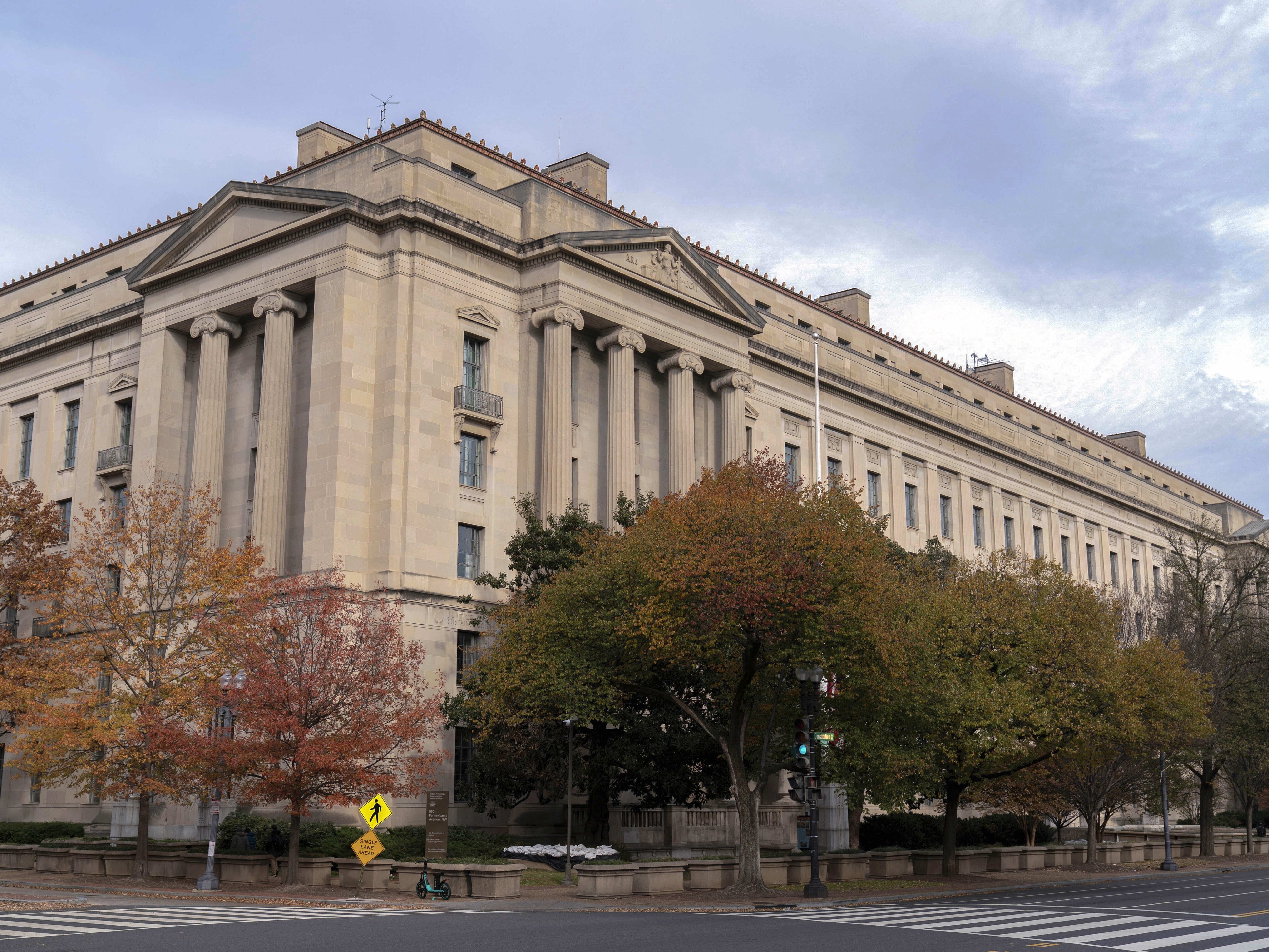 caption: The U.S. Department of Justice building is seen in Washington, D.C., on Dec. 7, 2024.