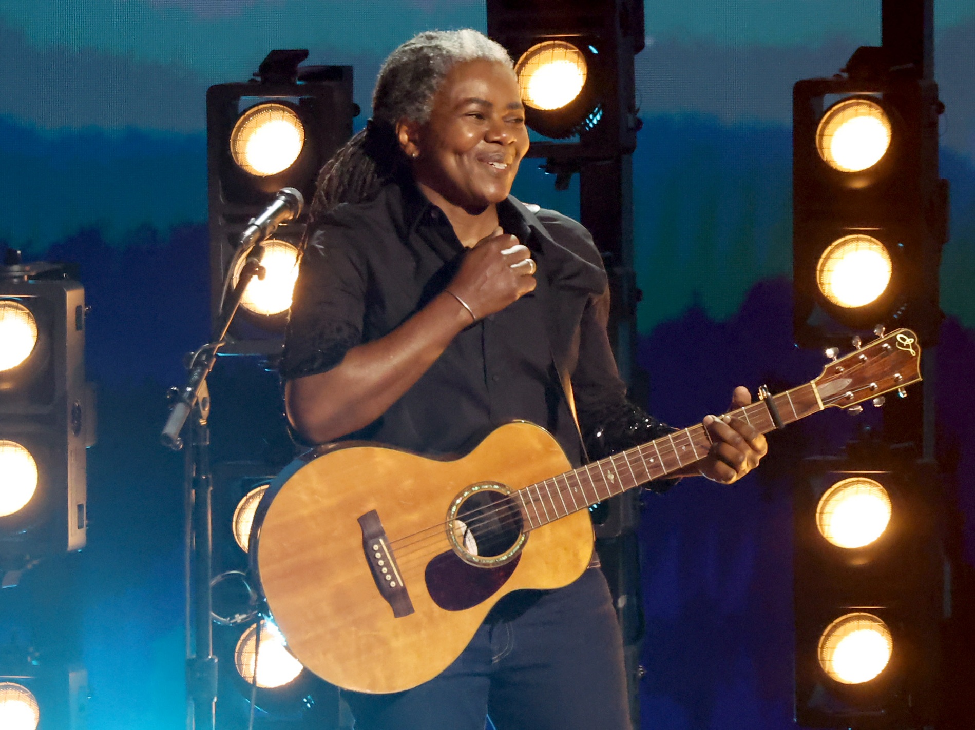 caption: Tracy Chapman performs during the 66th Grammy Awards on Feb. 4, 2024 in Los Angeles.