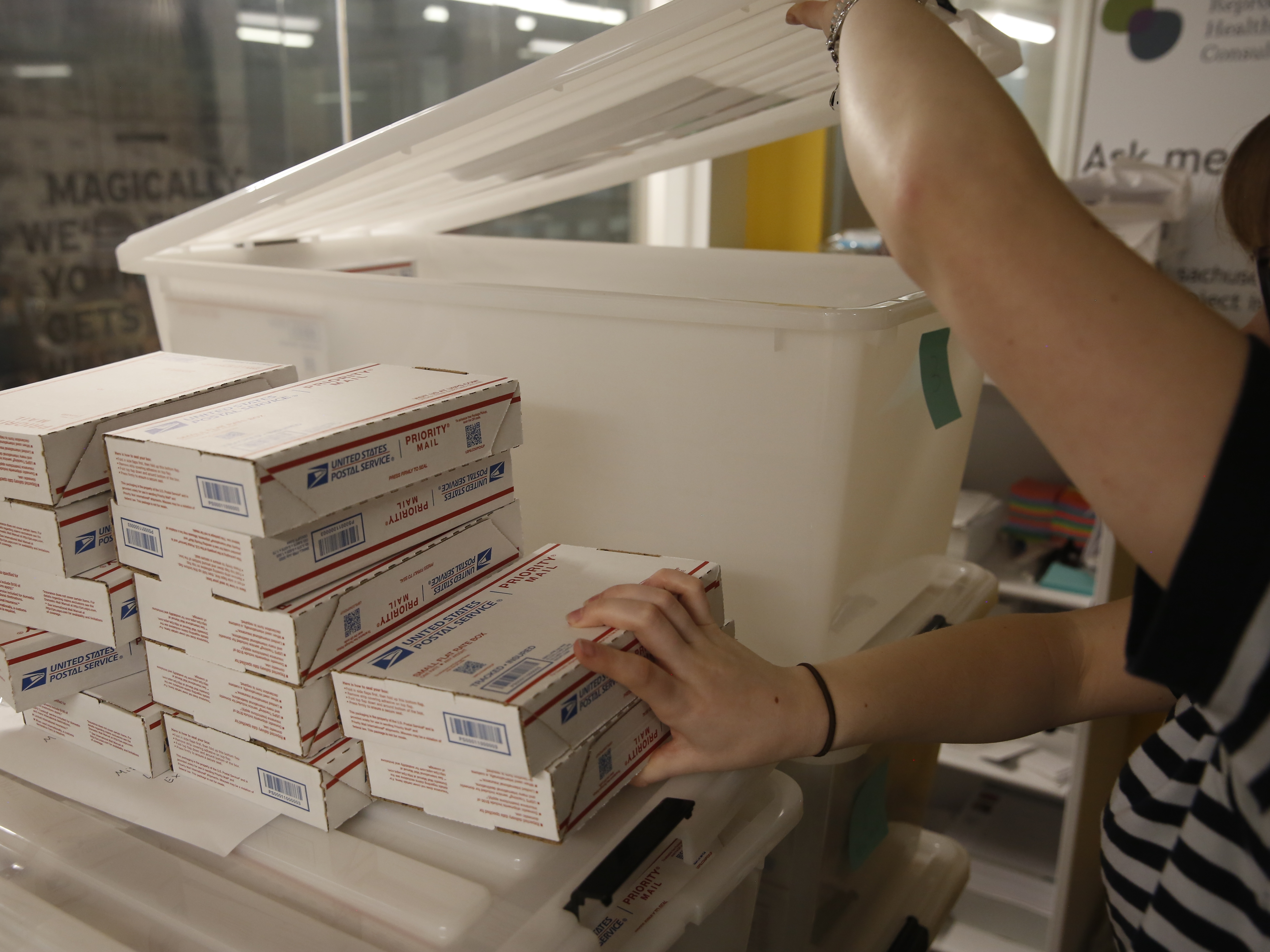 caption: “Welcome to modern abortion care,” says Angel Foster, who leads operations at what’s known as<strong> </strong>the MAP, a Massachusetts telehealth provider sending pills to people who live in states that ban or restrict abortion.