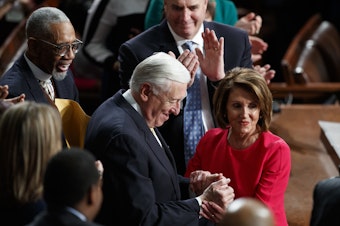 caption: New Speaker of the House Nancy Pelosi, D-Calif., and Steny Hoyer, D-Md., are applauded at the Capitol on Thursday as Democrats officially regain control of the chamber.