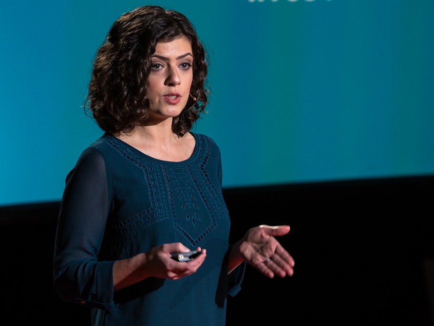 caption: Masha Gershman on the TED stage.