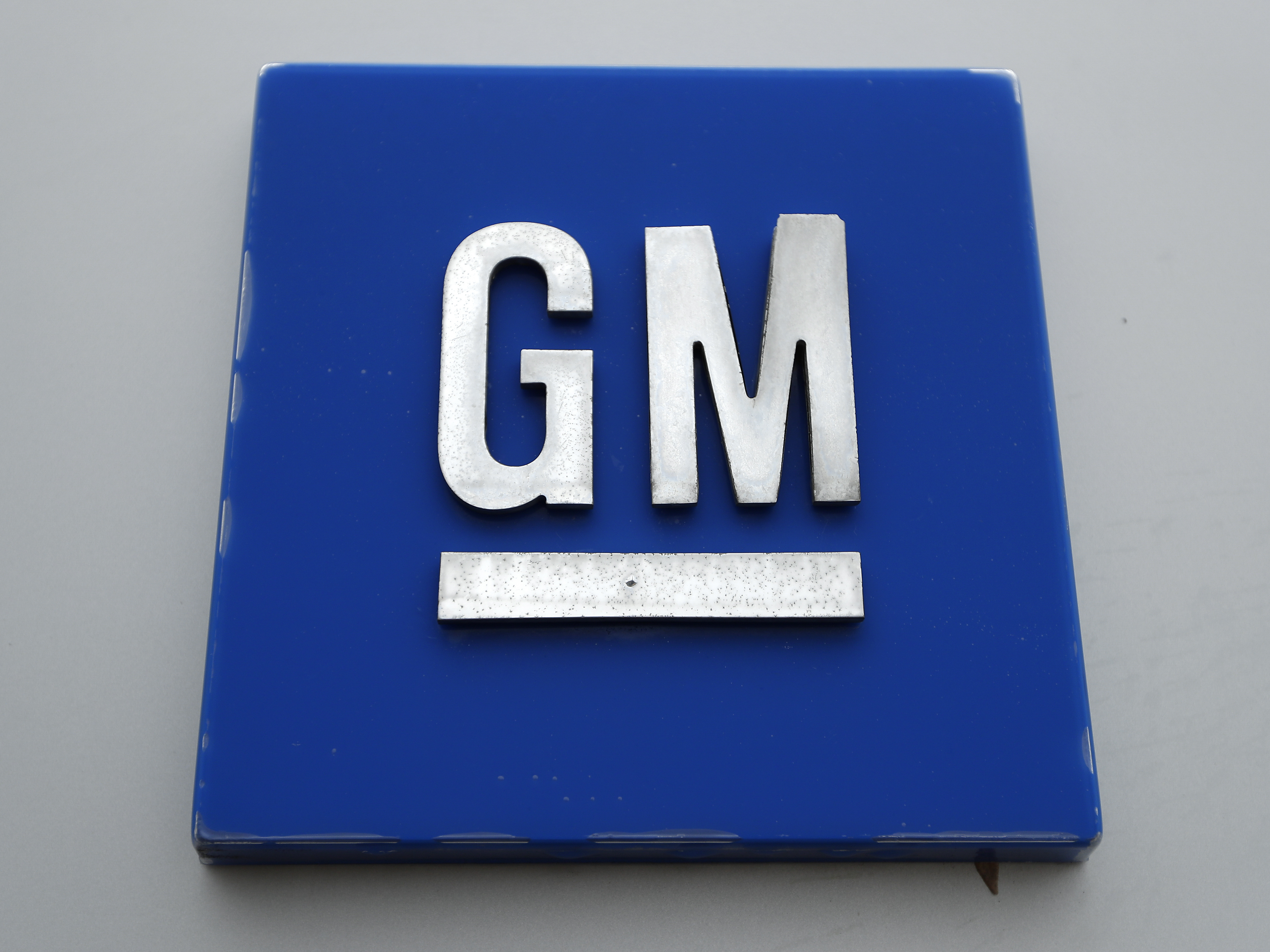 caption: A General Motors logo is displayed outside the General Motors Detroit-Hamtramck Assembly plant on Jan. 27, 2020, in Hamtramck, Mich.
