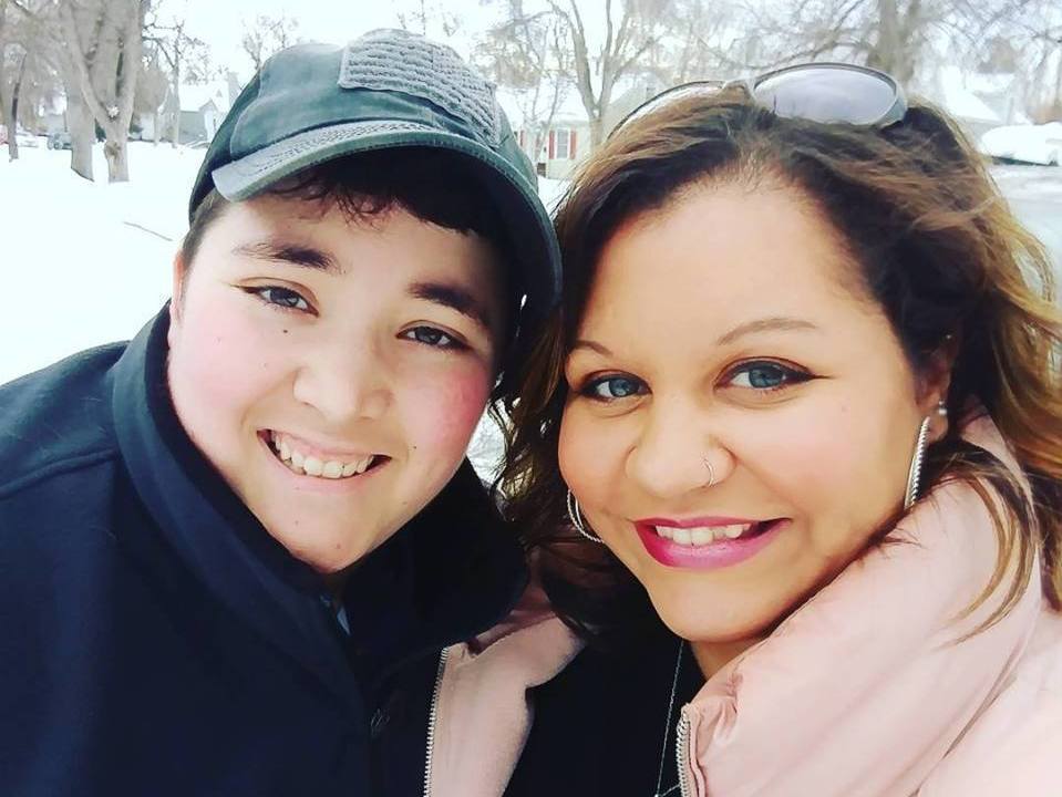 caption: Kathleen O'Donnell, left, with her wife, Casey. Since 2014, the couple has lived in Billings, Mont., where there is no explicit law that protects LGBTQ people from discrimination in housing, employment or public accommodations.