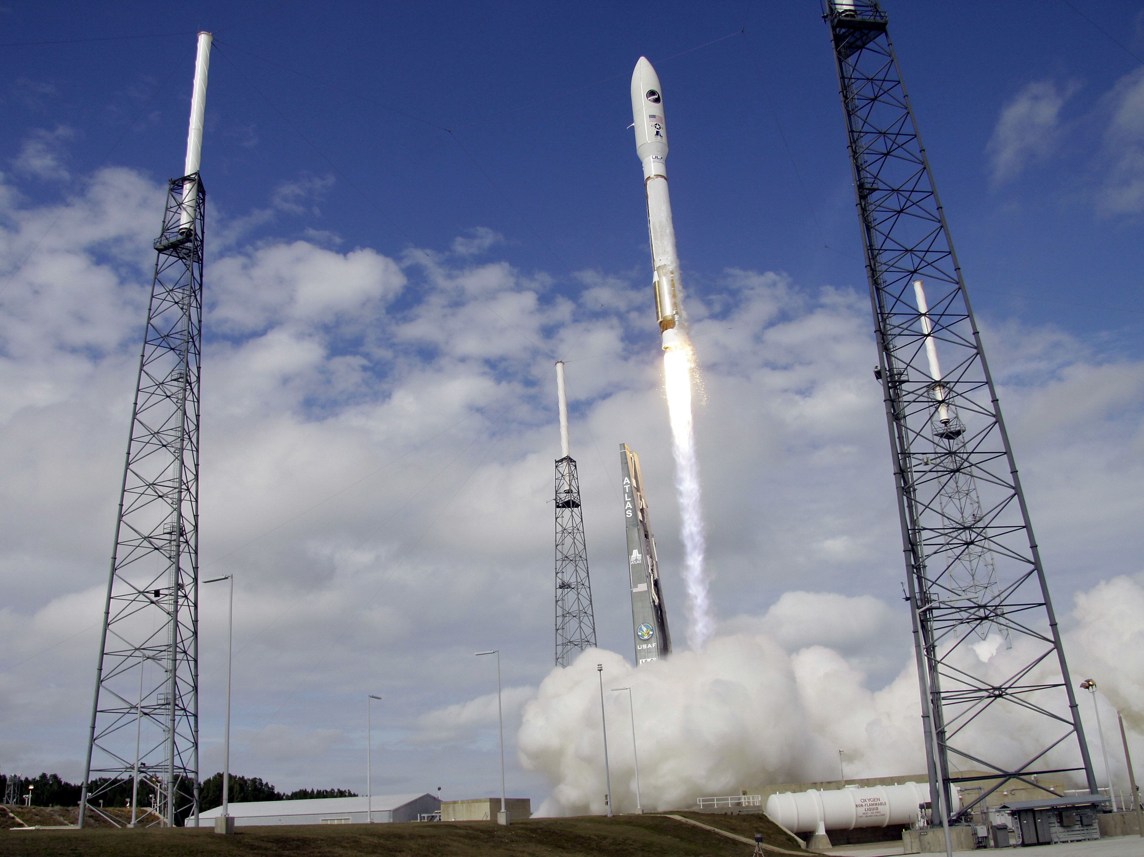 caption: The Air Force is in charge of some military space activities, such as an X-37B experimental robotic space plane, shown here as it was launched by a rocket.