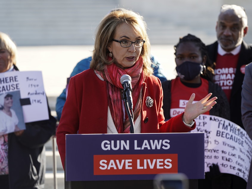 caption: Former Arizona congresswoman and shooting survivor Gabby Giffords speaks during a demonstration with victims of gun violence in front of the Supreme Court as arguments begin in a major case on gun rights on November 3, 2021 in Washington, DC.