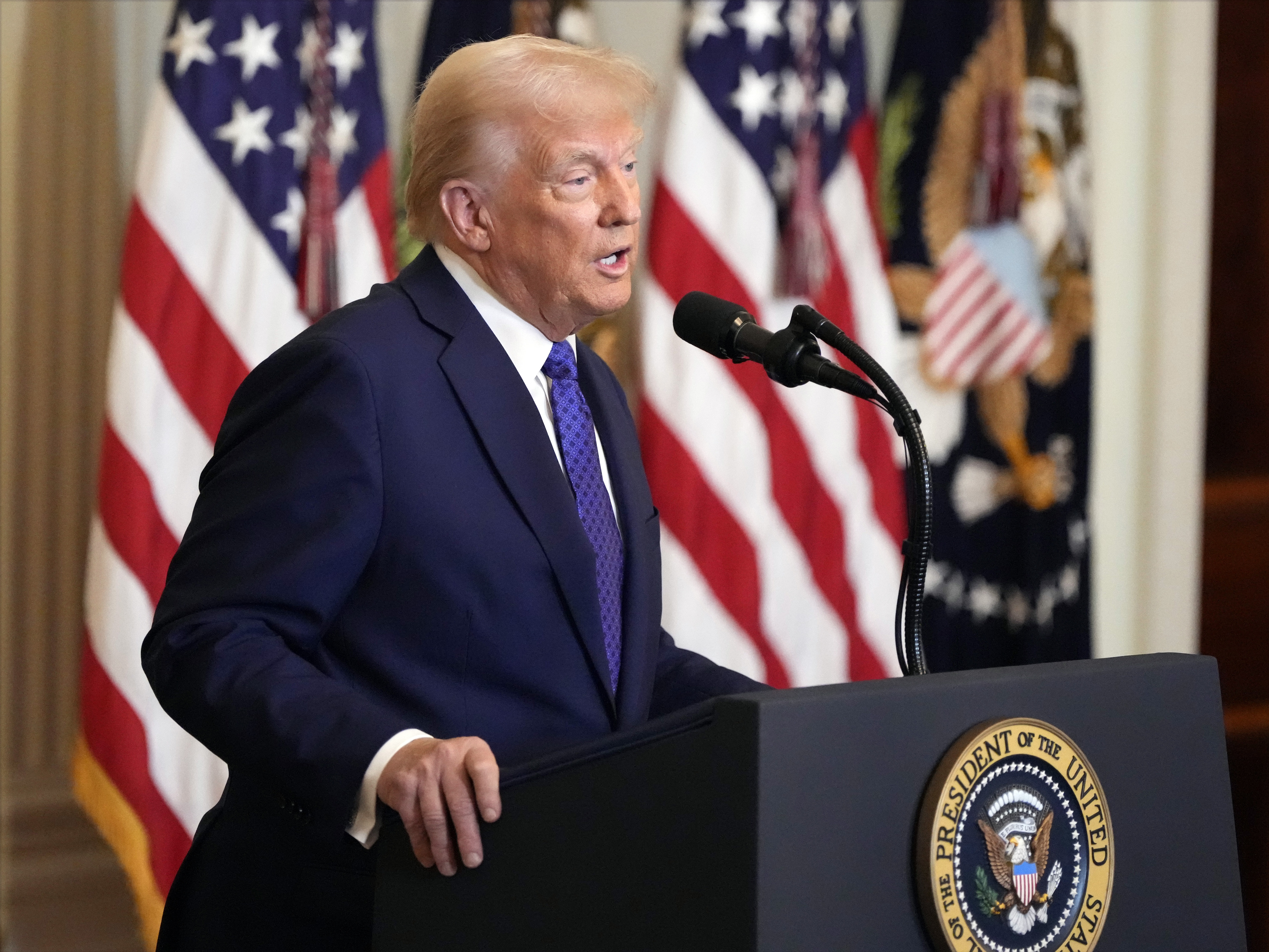 caption: President Donald Trump speaks before signing the Laken Riley Act in the East Room of the White House, Wednesday, Jan. 29, 2025, in Washington.