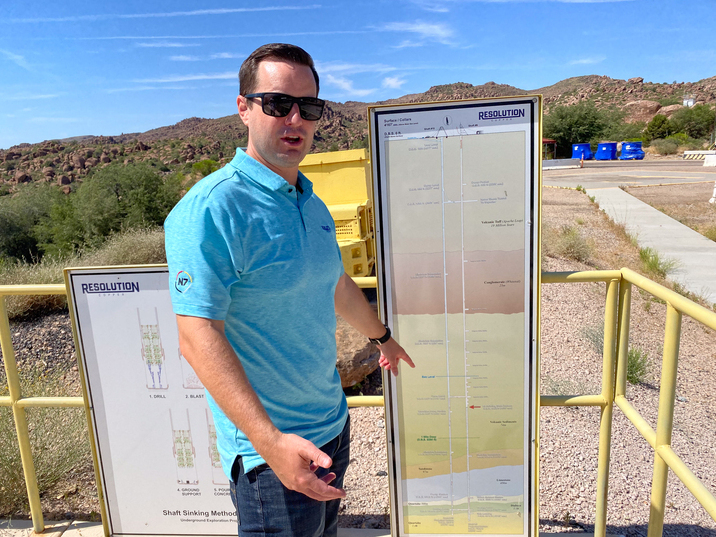 caption: Tyson Nansel, spokesperson for the Resolution Copper mine, shows how the copper is about 6,800 feet underground. To process the copper, the mine will use billions of gallons of local water and stored Colorado River water.