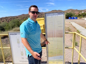 caption: Tyson Nansel, spokesperson for the Resolution Copper mine, shows how the copper is about 6,800 feet underground. To process the copper, the mine will use billions of gallons of local water and stored Colorado River water.