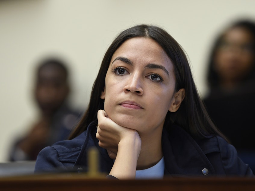 caption: Rep. Alexandria Ocasio-Cortez, D-N.Y., is being sued by two people who said they were blocked from her popular Twitter account.