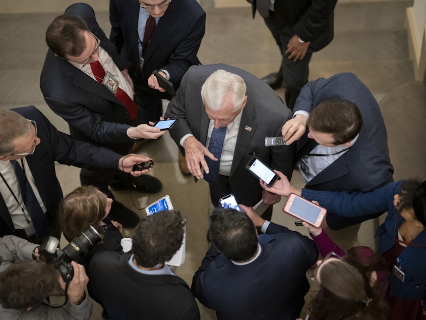 caption: House Majority Leader Steny Hoyer, D-Md., is questioned by reporters as House Speaker Nancy Pelosi and the Trump administration negotiate an agreement on a coronavirus aid package.