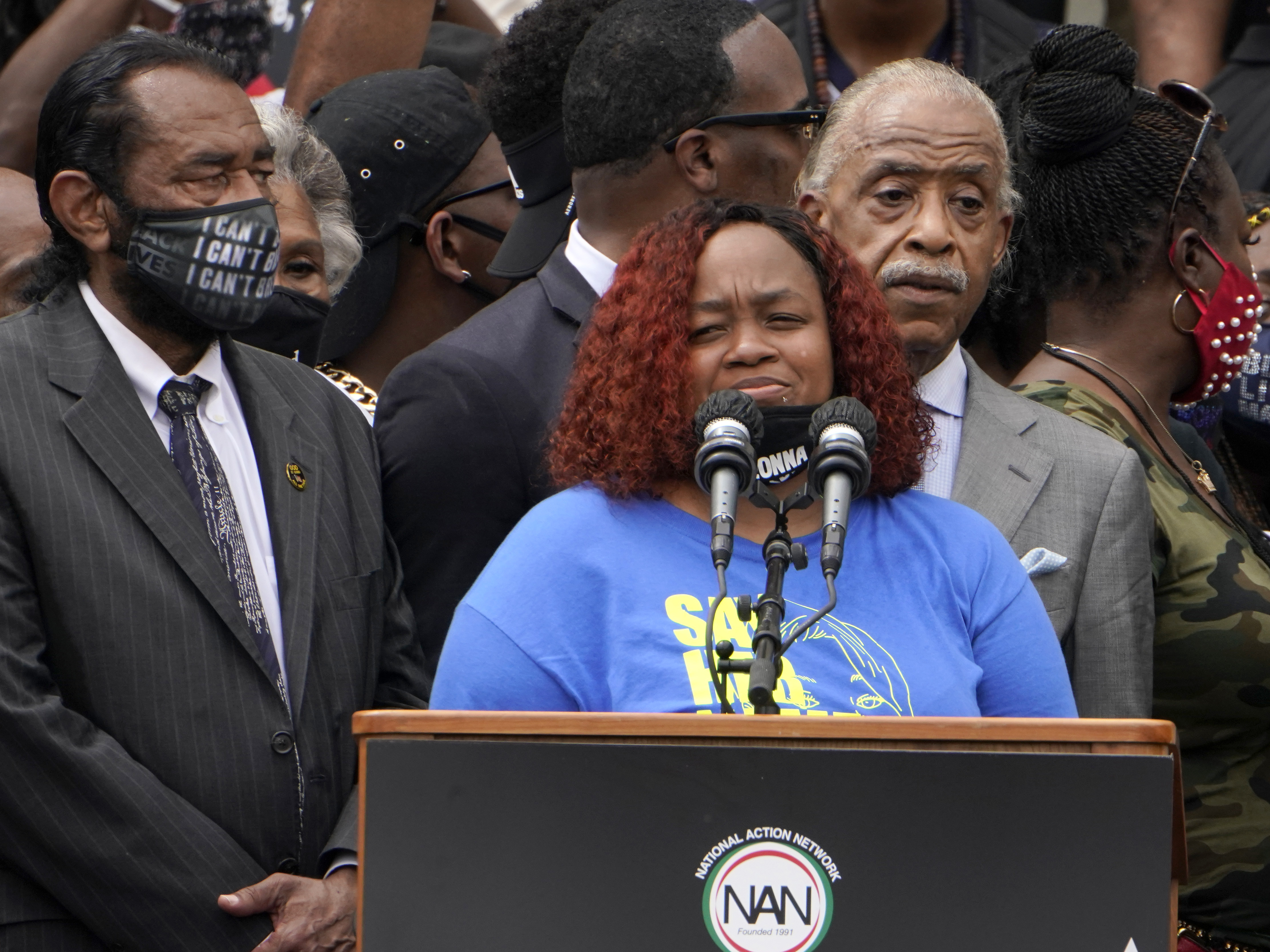 caption: Tamika Palmer spoke at the March on Washington last month at the Lincoln Memorial in Washington, D.C. At left is Rep. Al Green, D-Texas, and at right is the Rev. Al Sharpton.