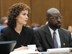 caption: Sarah Paulson plays prosecutor a Marcia Clark and Sterling K. Brown is Christopher Darden in the FX series <em>American Crime Story: The People vs. O.J. Simpson. </em>