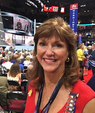 caption: Washington state GOP chair Susan Hutchison on the floor of the Republican convention in Cleveland in 2016.