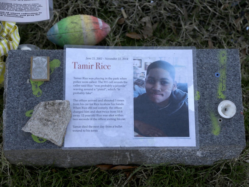 caption: The Justice Department announced Tuesday that it would not bring federal criminal charges against two Cleveland police officers in the 2014 killing of 12-year-old Tamir Rice (pictured in a memorial). Officials said video of the shooting was of too poor a quality for prosecutors to conclusively establish what had happened.