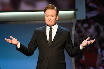 caption: Host Conan O'Brien speaking onstage during the 5th Annual NFL Honors in San Francisco, Calif.