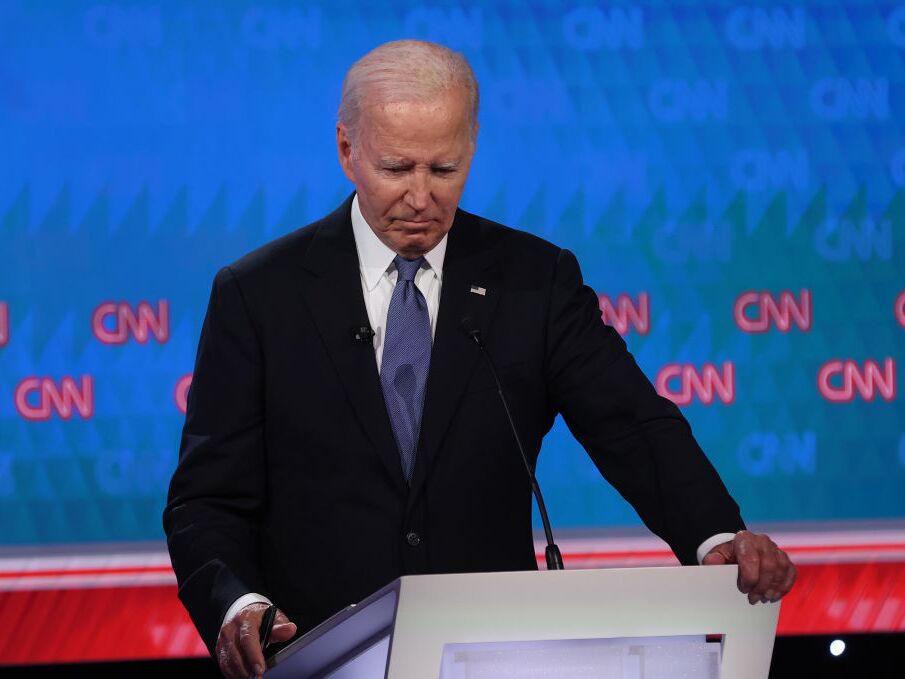 caption: President  Biden pauses during the CNN Presidential Debate at the CNN Studios on June 27in Atlanta. 
