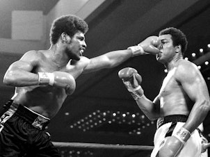 caption: Leon Spinks lands a punch on Muhammad Ali in the title fight in Las Vegas on Feb. 15, 1978. Spinks beat Ali to claim the heavyweight championship and shock the boxing world.