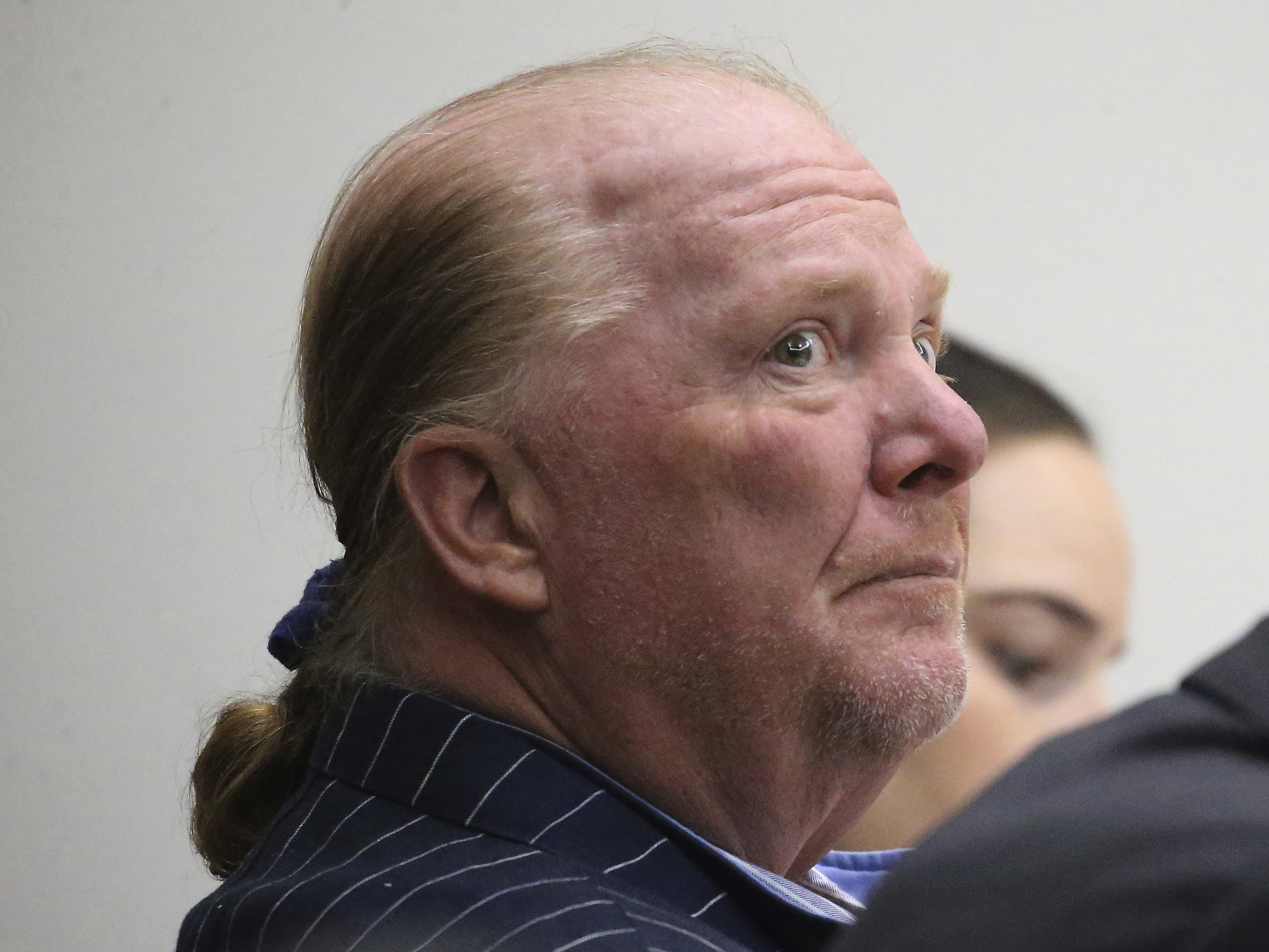 caption: Celebrity chef Mario Batali at Boston Municipal Court on the second day of trial on Tuesday in Boston.