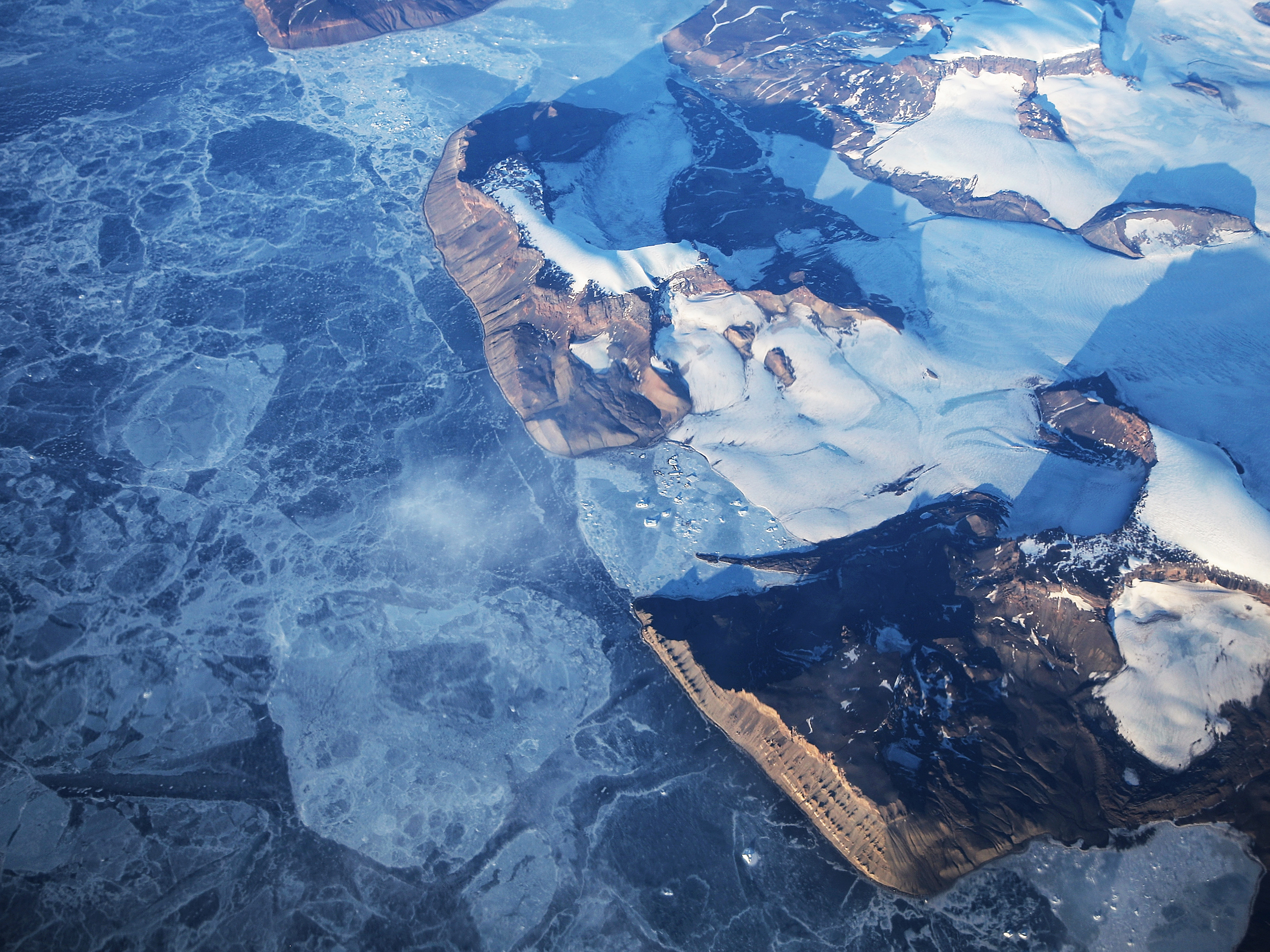 caption: At its most expansive, Antarctic sea ice covers an area the size of Antarctica itself, doubling the size of the frozen continent. But the winter sea ice has been shrinking, and this year there was less ice than ever before, going back to when satellites started tracking annual ice extent around 1980.