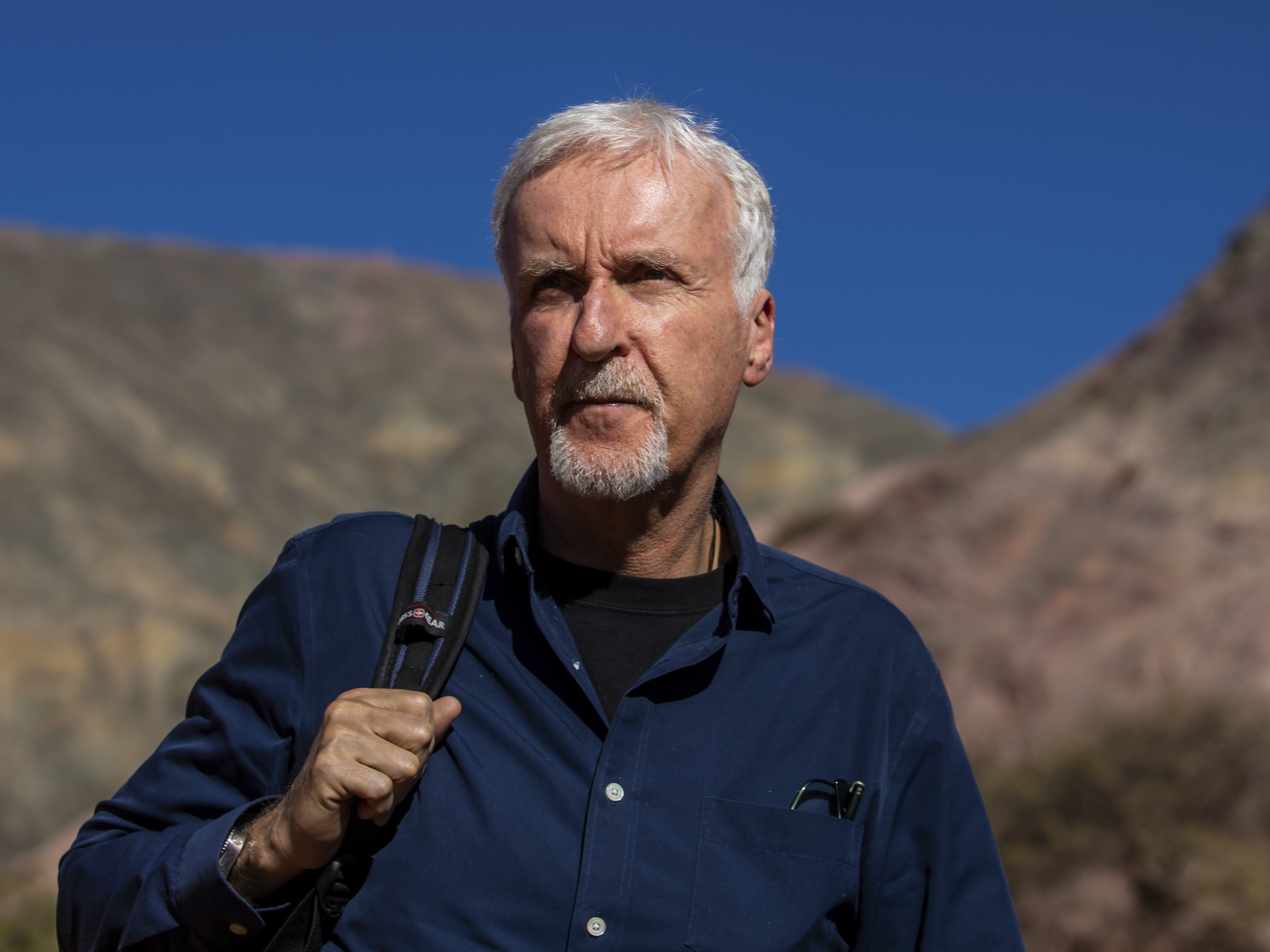 caption: James Cameron walks in Purmamarca, Argentina, earlier this month. He's compared the OceanGate submersible tragedy to that of the Titanic itself.