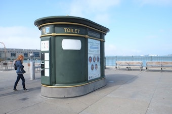 caption: A permanent public toilet in San Francisco. 