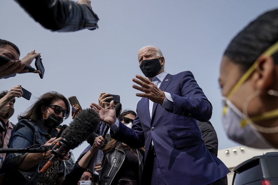 caption: Democratic presidential nominee and former Vice President Joe Biden speaks to reporters before boarding a plane to Florida at New Castle County Airport on September 15, 2020 in New Castle, Delaware. (Drew Angerer/Getty Images)