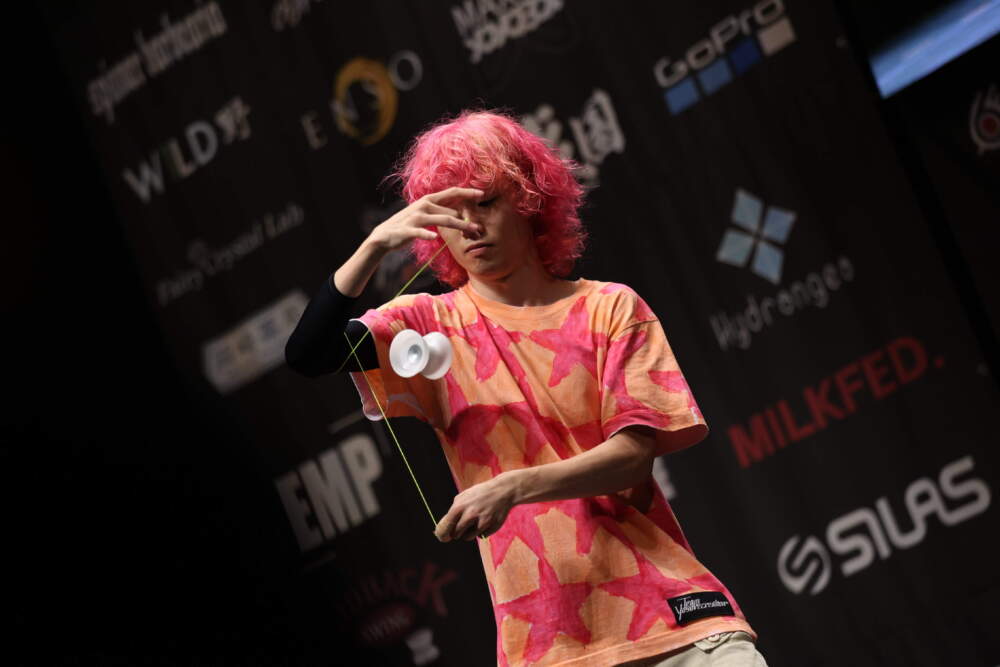 caption: A competitor in the 2023 World Yo-Yo Contest. (Courtesy of IYYF.org)