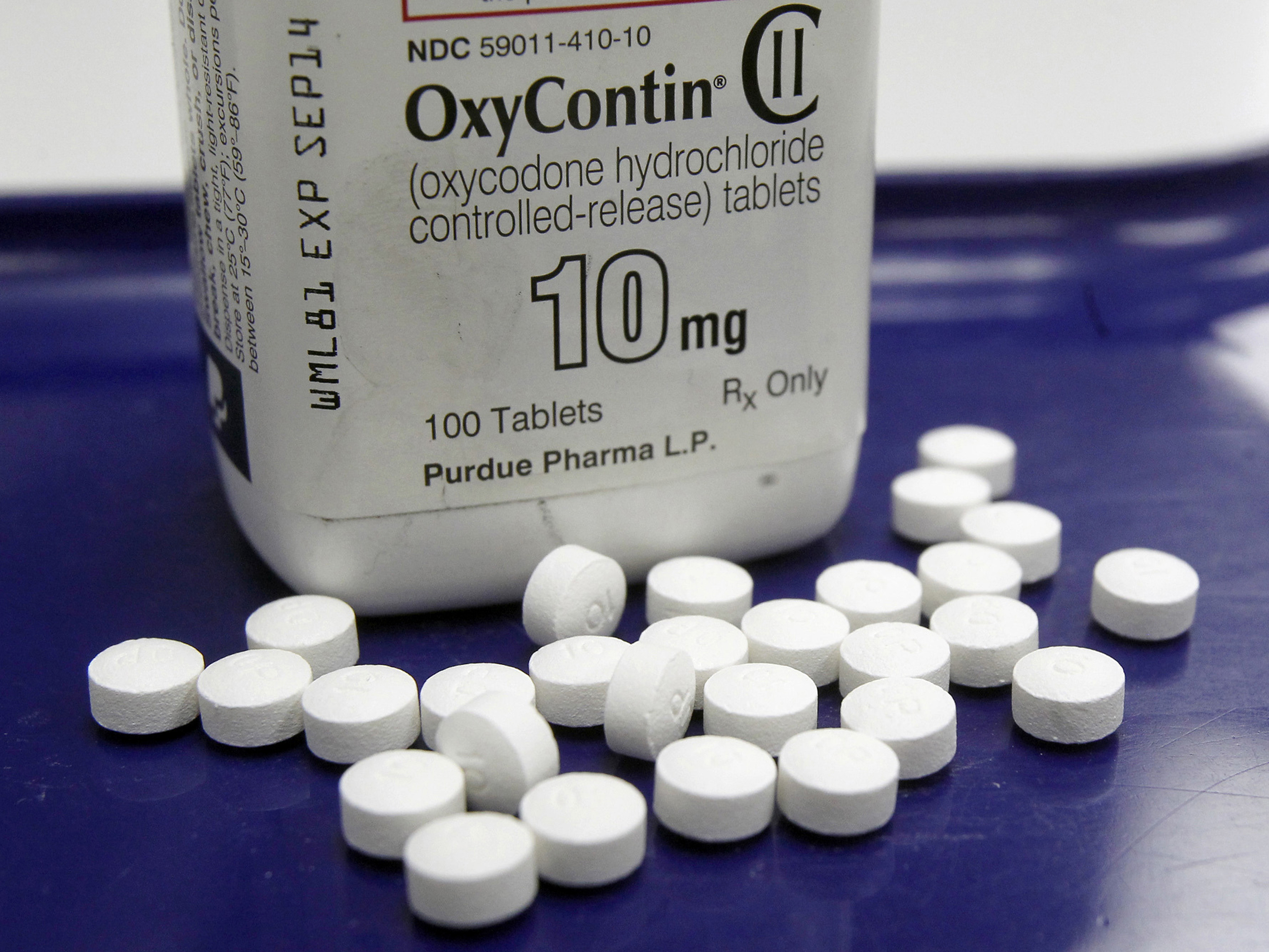 caption: OxyContin pills arranged at a pharmacy in Montpelier, Vt. Purdue Pharma makes the highly addictive drug.